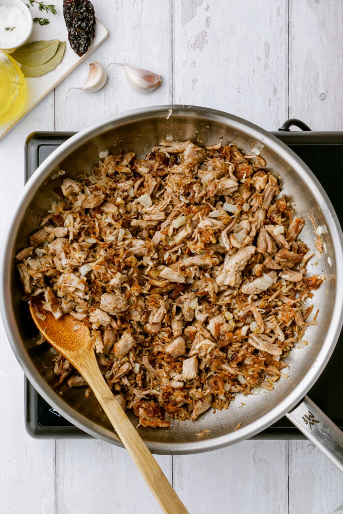 Once pork is browned and ready to go, you can add additional spices to make tinga