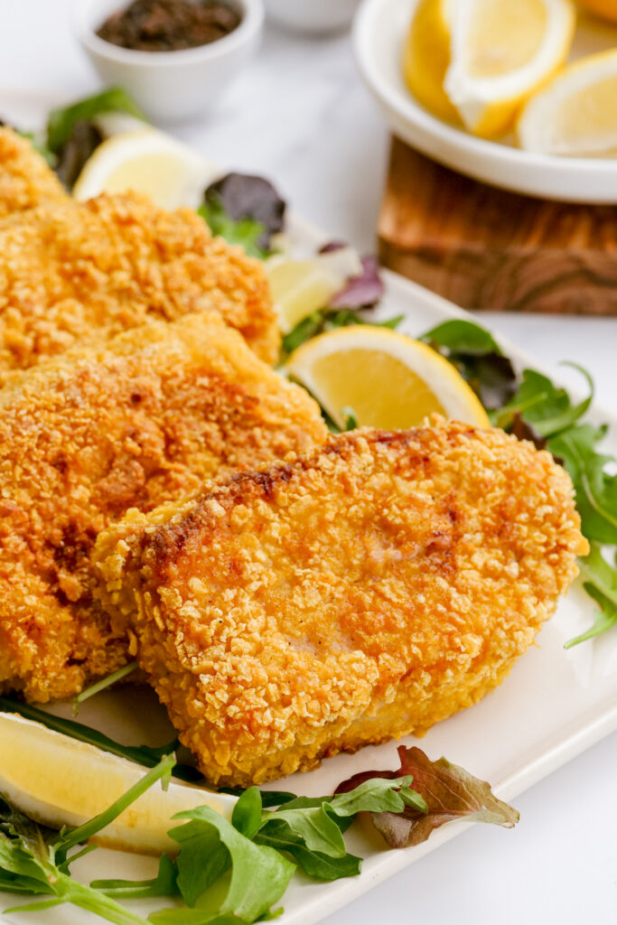 breaded pork chips on a plate