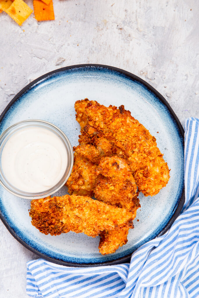 Air fryer cheesy chicken tenders made with Cheez-Its!