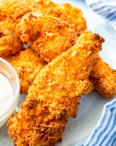 air fryer chicken tenders coated in a crispy coating of cheez-it crackers