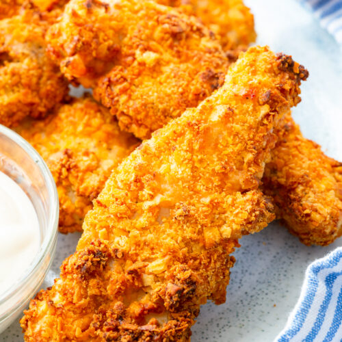 air fryer chicken tenders coated in a crispy coating of cheez-it crackers