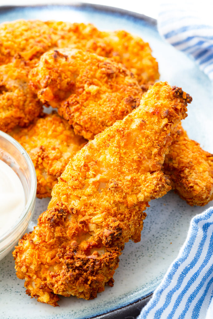 air fryer chicken tenders coated in a crispy coating of cheez-it crackers