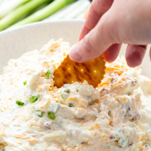 A bowl of crack dip, an easy to make chip or cracker dip that is loaded with flavor.