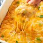 Texas trash dip, a warm bean dip that is full of flavor, and cheesy goodness.