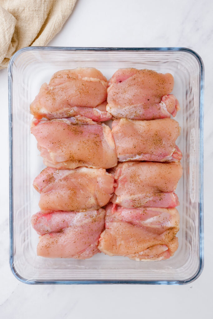 Trimmed and seasoned chicken thighs for chicken fricassee