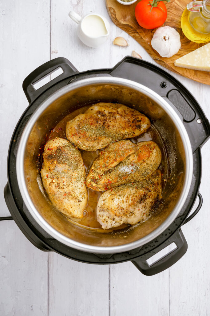 Searing chicken in the instant pot for a tuscan chicken