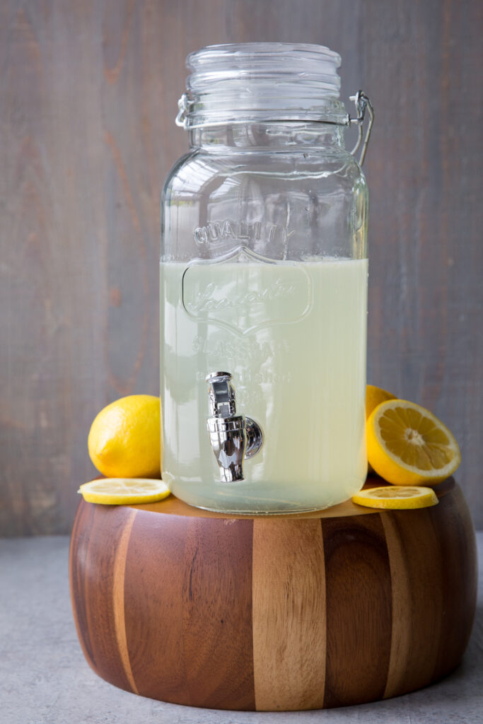 Homemade lemonade made from fresh squeezed lemons , sugar, and water.
