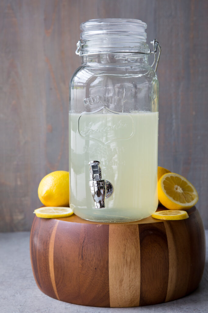 Homemade lemonade made from fresh squeezed lemons , sugar, and water. 