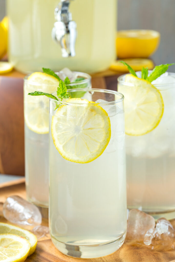 Homemade lemonade, a quick and easy three ingredient fresh squeezed lemonade recipe for the perfect summer drink. 