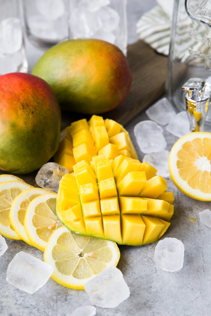 Ingredients for mango lemonade, a fresh made summer drink, easy lemonade recipe. 