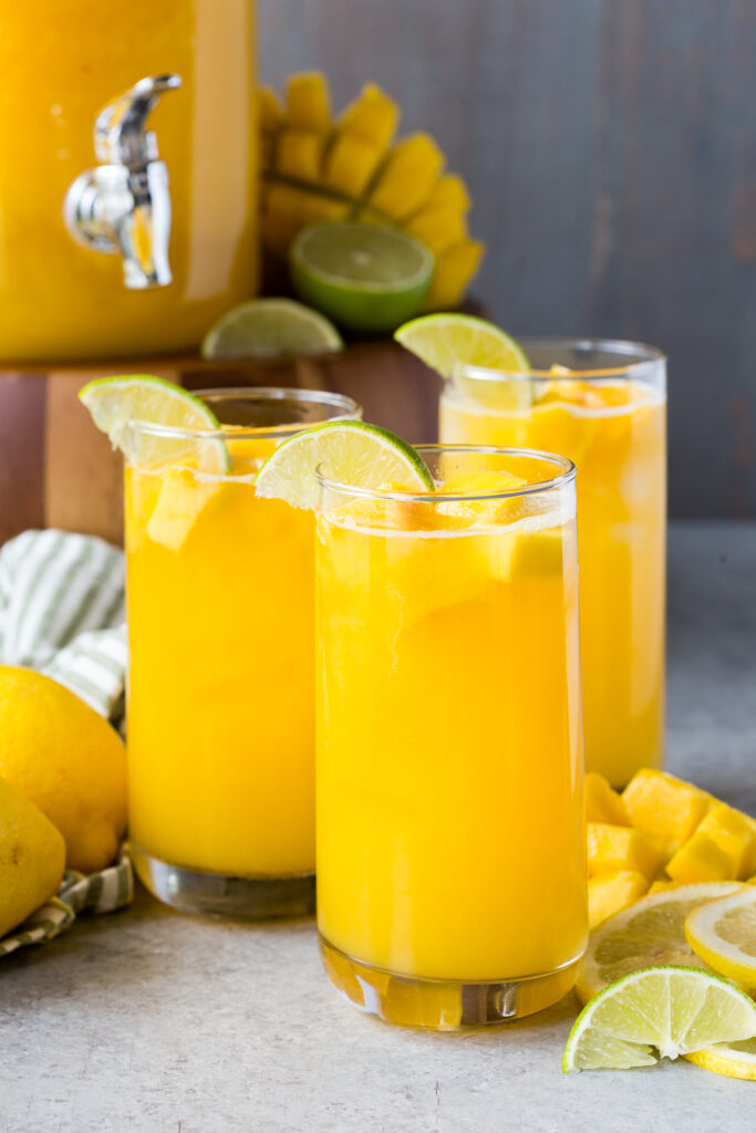 glasses of mango lemonade, fresh made lemonade flavored with mangos. 