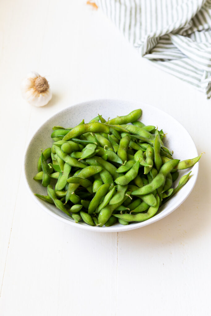 A bowl of steamed edamame