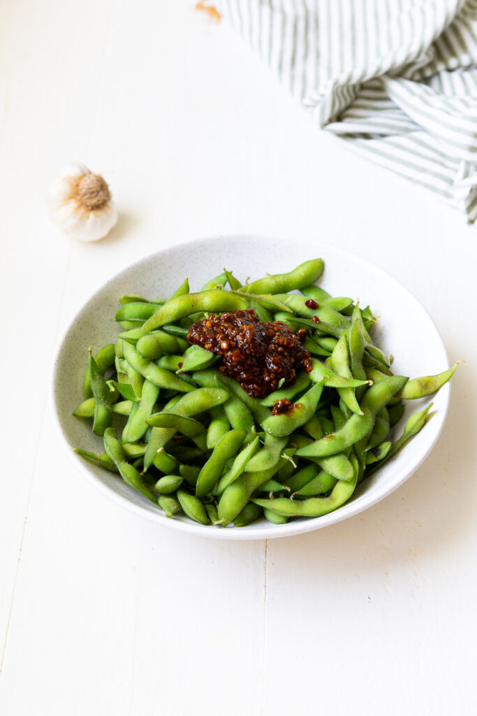 Making the sauce for spicy garlic ginger edamame