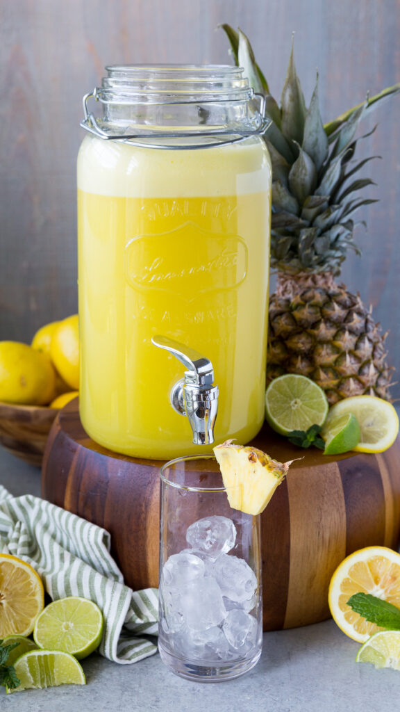 A pitcher full of pineapple lemonade ready to be served. 
