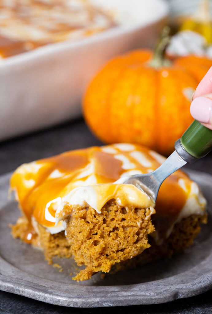 Pumpkin poke cake, with the best frosting, and the most flavor. 