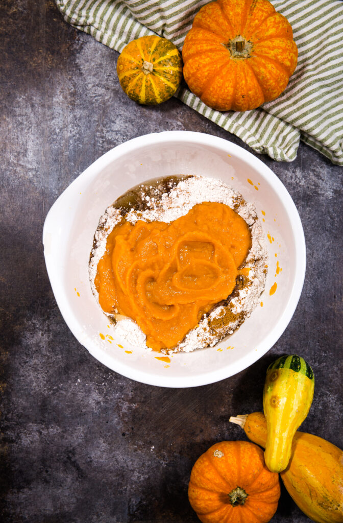 Making pumpkin poke cake