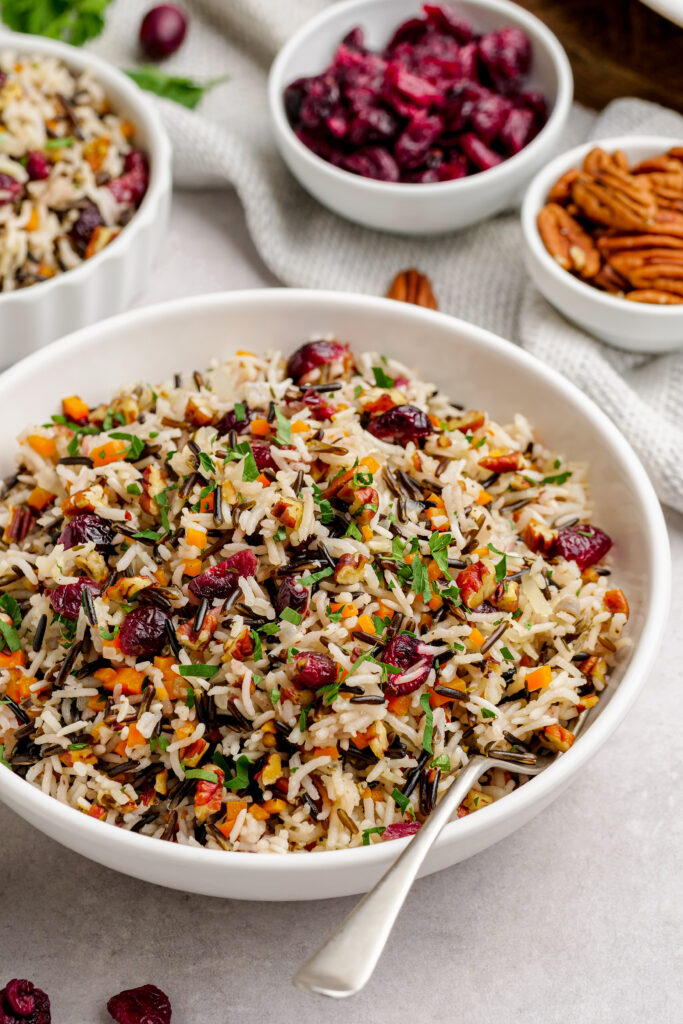 Wild Rice Pilaf, an easy side dish that goes with EVERYTHING, it colorful, bright, flavorful, and totally nutritious. You will want to eat this on repeat. 