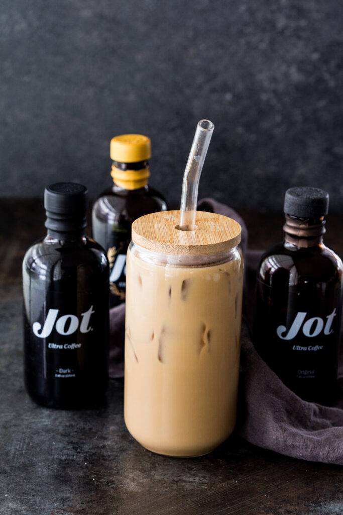 Making an iced vanilla latte using Jot brews