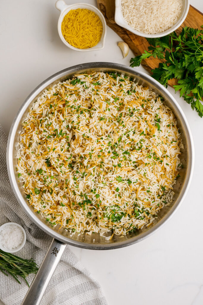 Herbed Rice Pilaf: Fluffed rice pilaf with herbs added in, for a delicious herbed rice pilaf