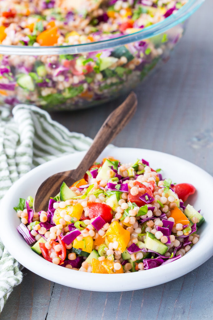 A big bowl of Israeli couscous salad