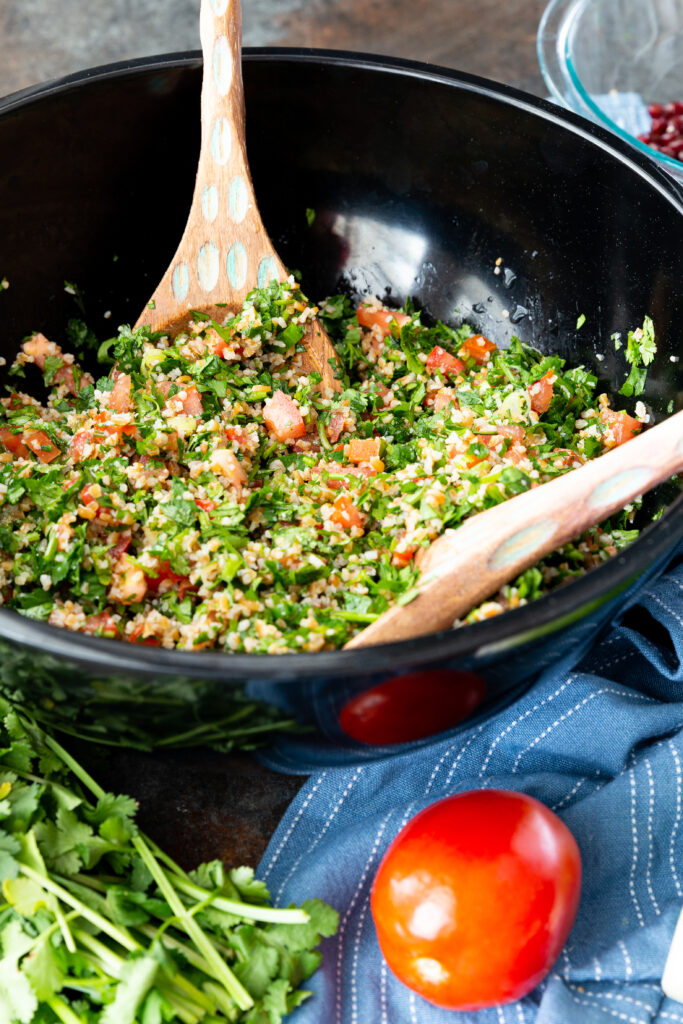 A bowl of Israeli Tabbouleh salad, a great herby salad with bulgur, and a lemony dressing. 