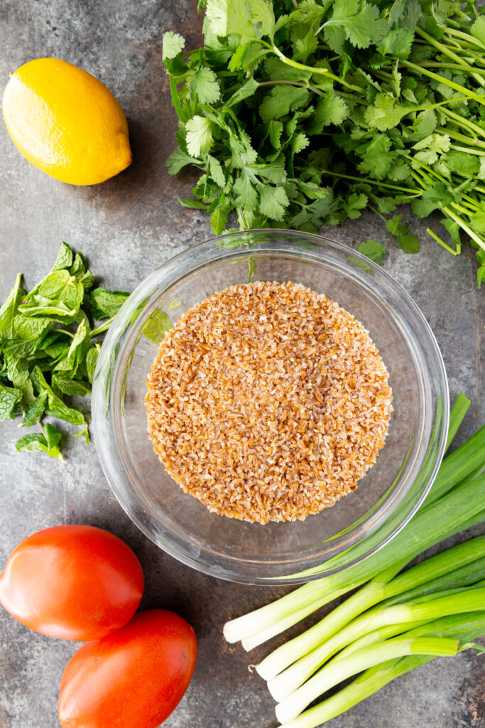 What you need to make Tabbouleh, an Israeli salad with fresh herbs, bulgur, and fresh pomegranate