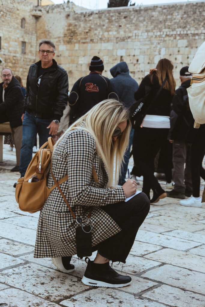 Writing prayers to put in the Wailing Wall