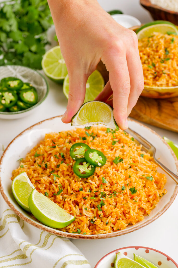 Garnish and serving Mexican Rice.