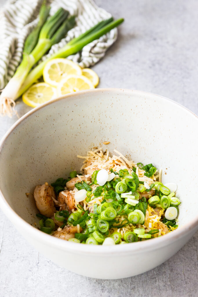 Adding in the rest of the ingredients to make this delightful shrimp dish. 