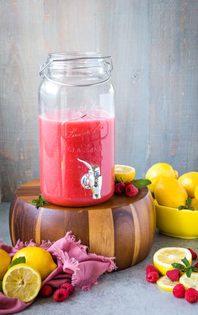 A pitcher full of raspberry lemonade