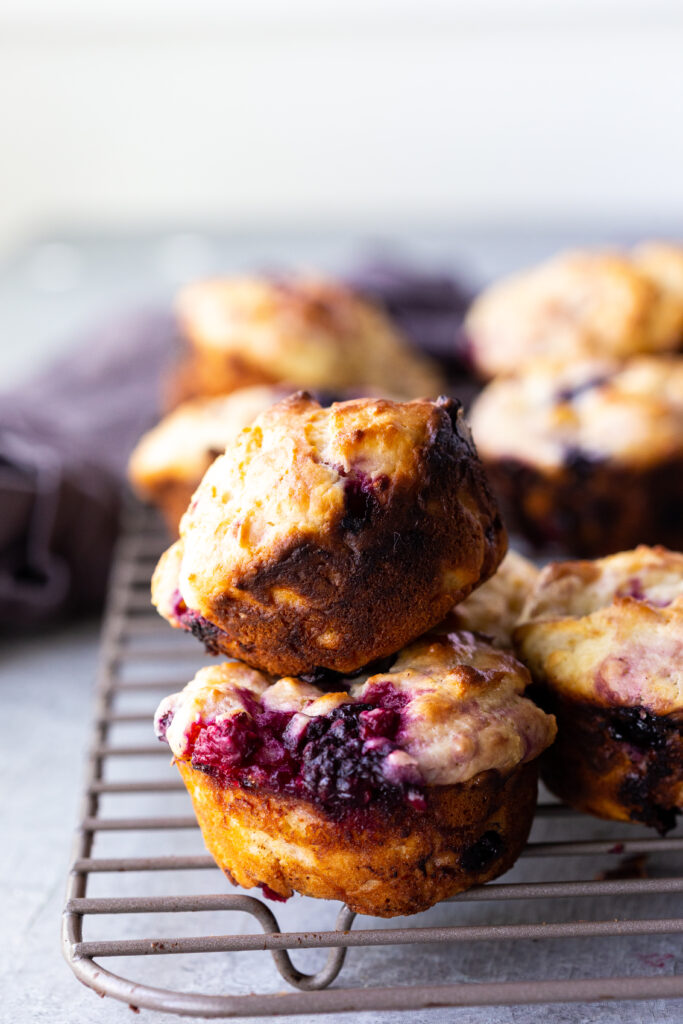 Moist, decadent, delicious triple berry muffins, loaded with juicy summer berries