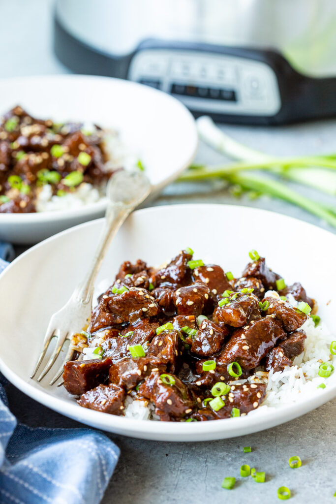 A plate of slow cooker teriyaki beef with homemade teriyaki sauce