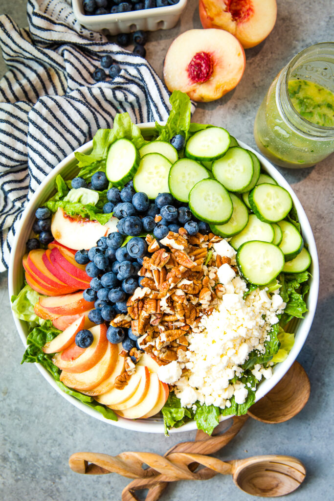 Peach Berry Summer Salad with a lemon vinaigrette