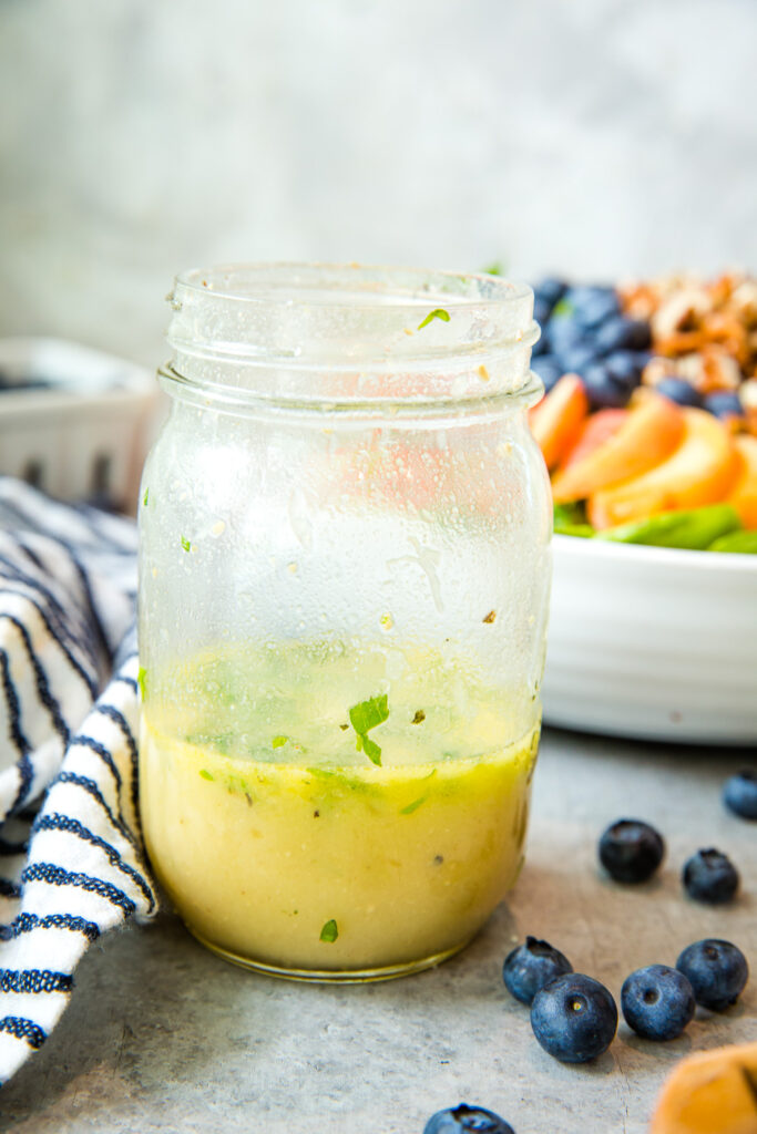 homemade lemon vinaigrette dressing for peach berry salad