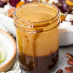 A creamy and deliciously smooth homemade balsamic vinaigrette in a mason jar.