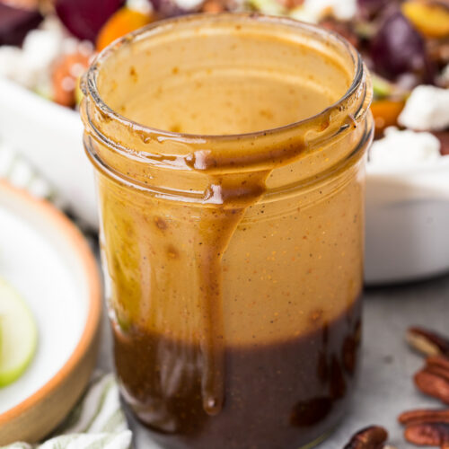 A creamy and deliciously smooth homemade balsamic vinaigrette in a mason jar.