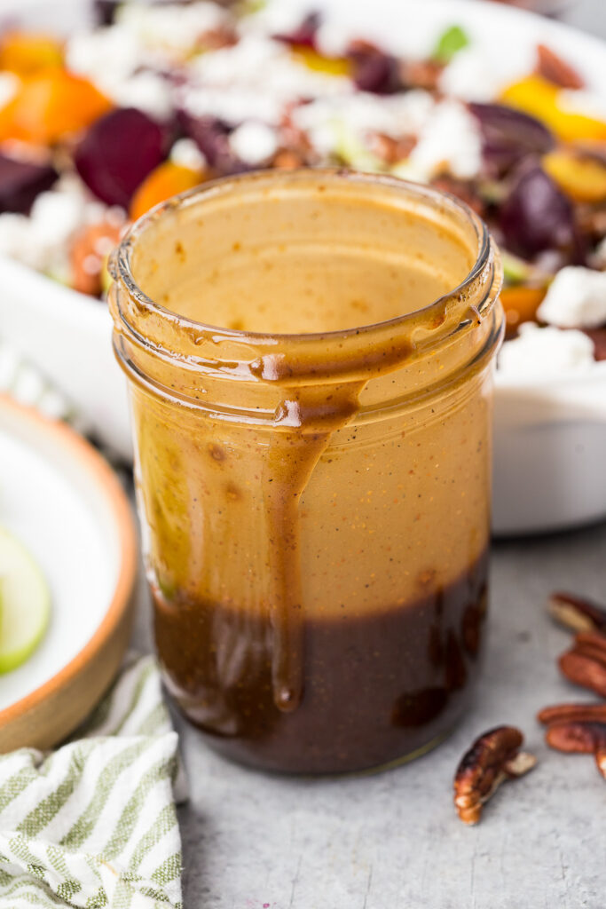A creamy and deliciously smooth homemade balsamic vinaigrette in a mason jar. 