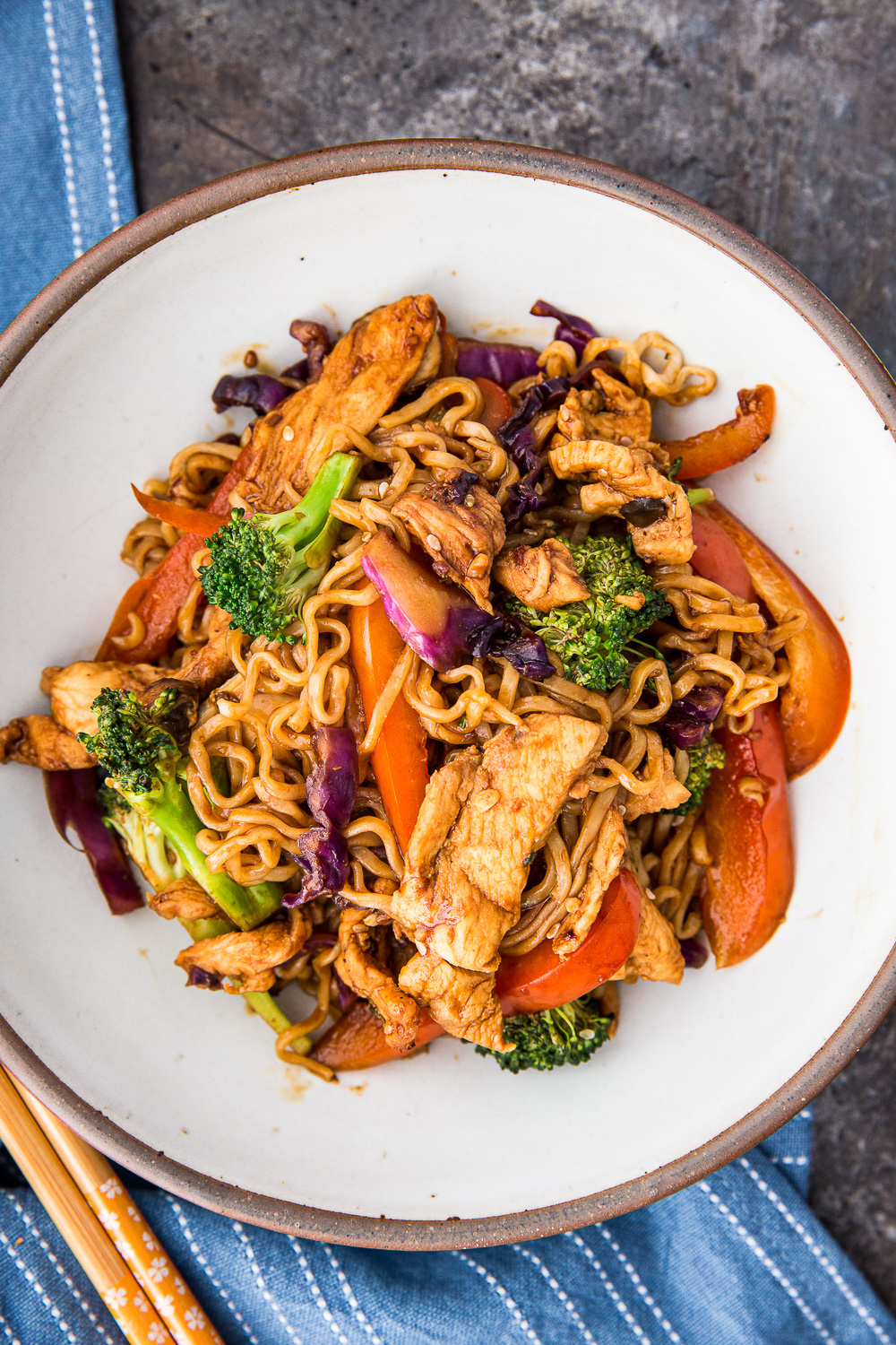 Easy ramen stir fry with chicken, tossed in a wok with homemade sauce, and prepared in under 30 minutes. 
