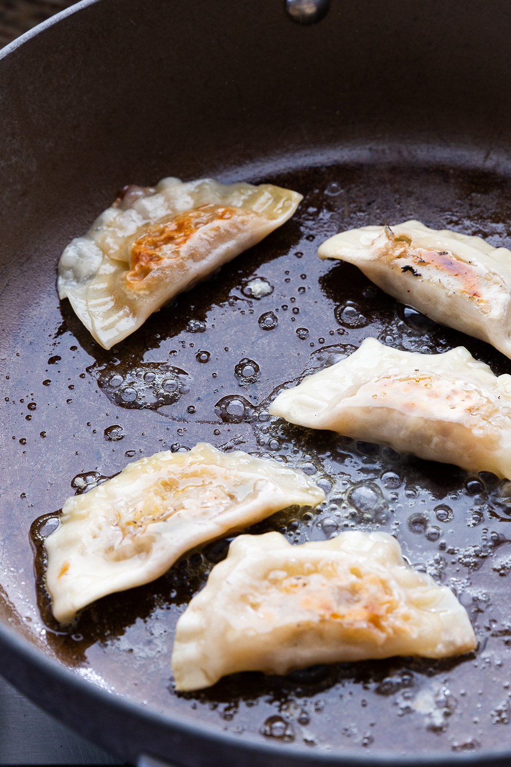 Pan frying pot stickers or pork dumplings