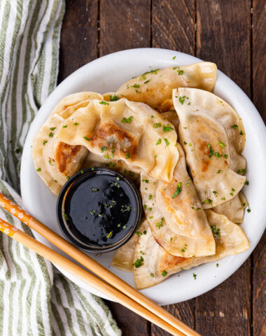 Amazing pork dumplings, pan fried and steamed and loaded with a tasty pork and cabbage filling.