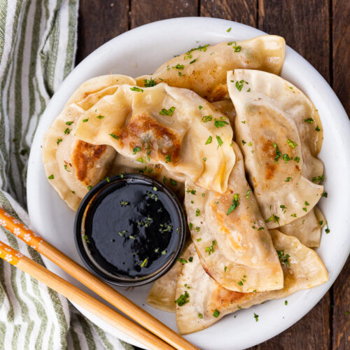 Amazing pork dumplings, pan fried and steamed and loaded with a tasty pork and cabbage filling.