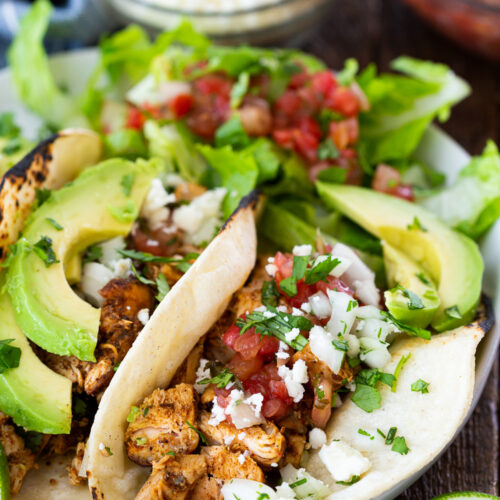 Easy chicken tacos, a simple spice rubbed chicken cooked stove top to make for the best, juiciest tacos.