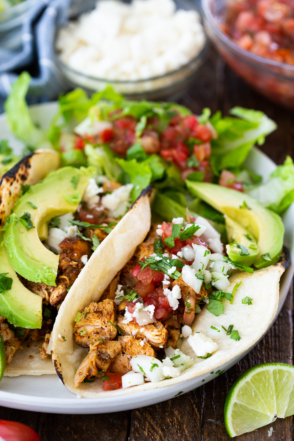 Easy chicken tacos, a simple spice rubbed chicken cooked stove top to make for the best, juiciest tacos. 