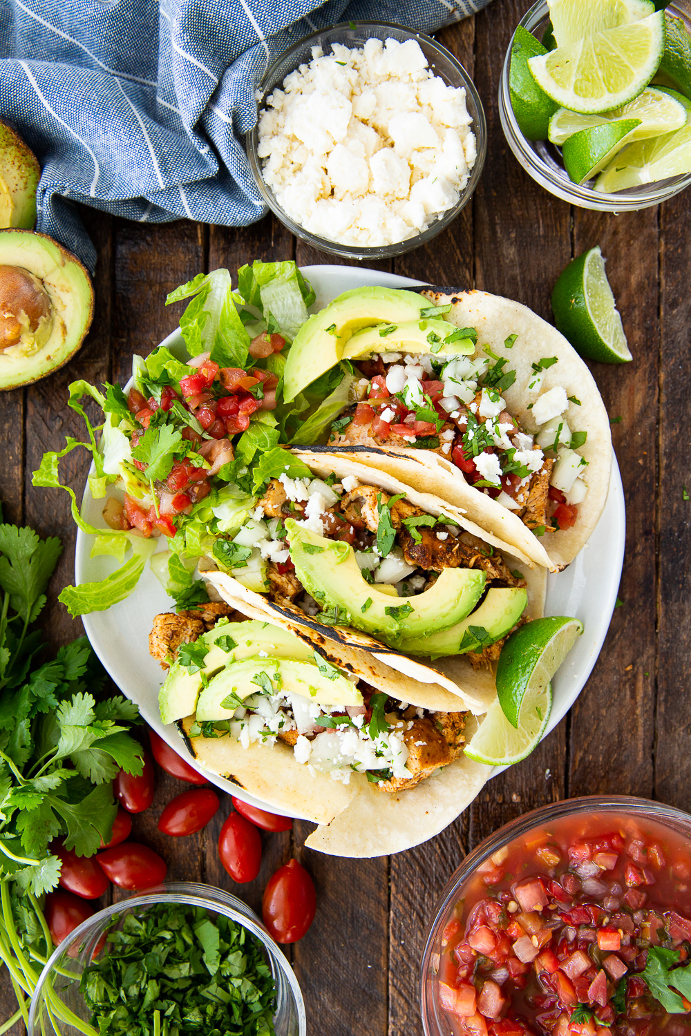 Easy chicken tacos, with simple spice rubbed chicken tossed with cilantro and lime juice. 