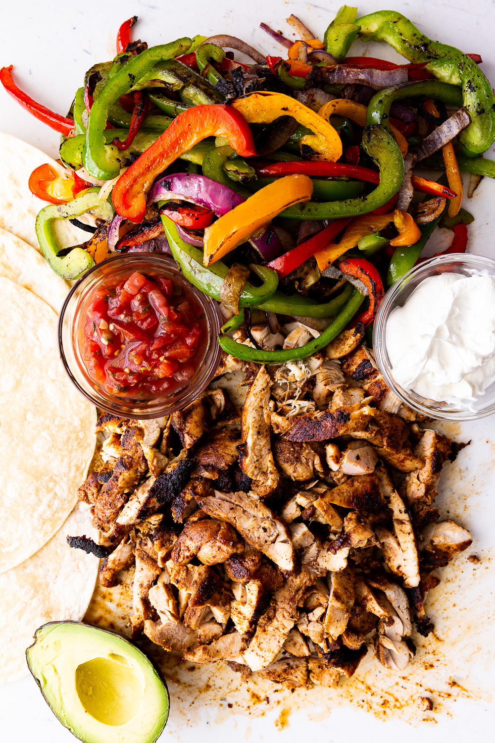 Easy Chicken Fajitas- A super simple recipe for classic chicken fajitas cooked stove top or on the grill or griddle. 