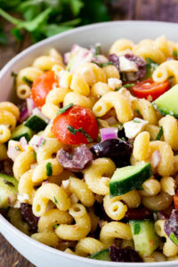 Mediterranean Pasta Salad- with a homemade dressing and all your favorite vegetables.