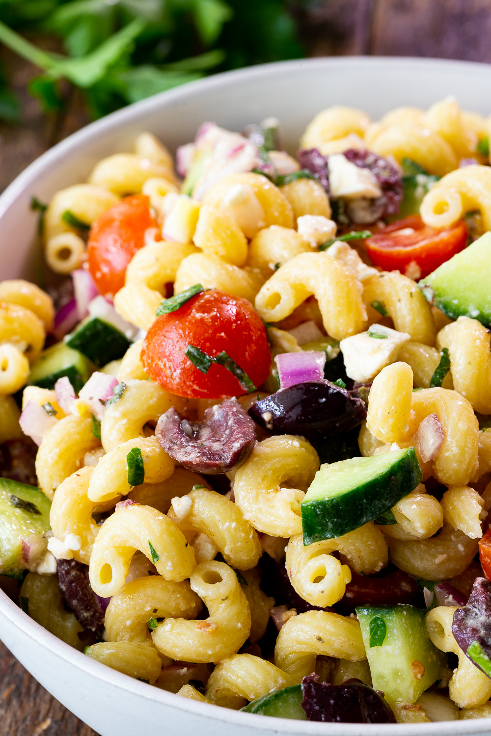 Mediterranean Pasta Salad- with a homemade dressing and all your favorite vegetables. 