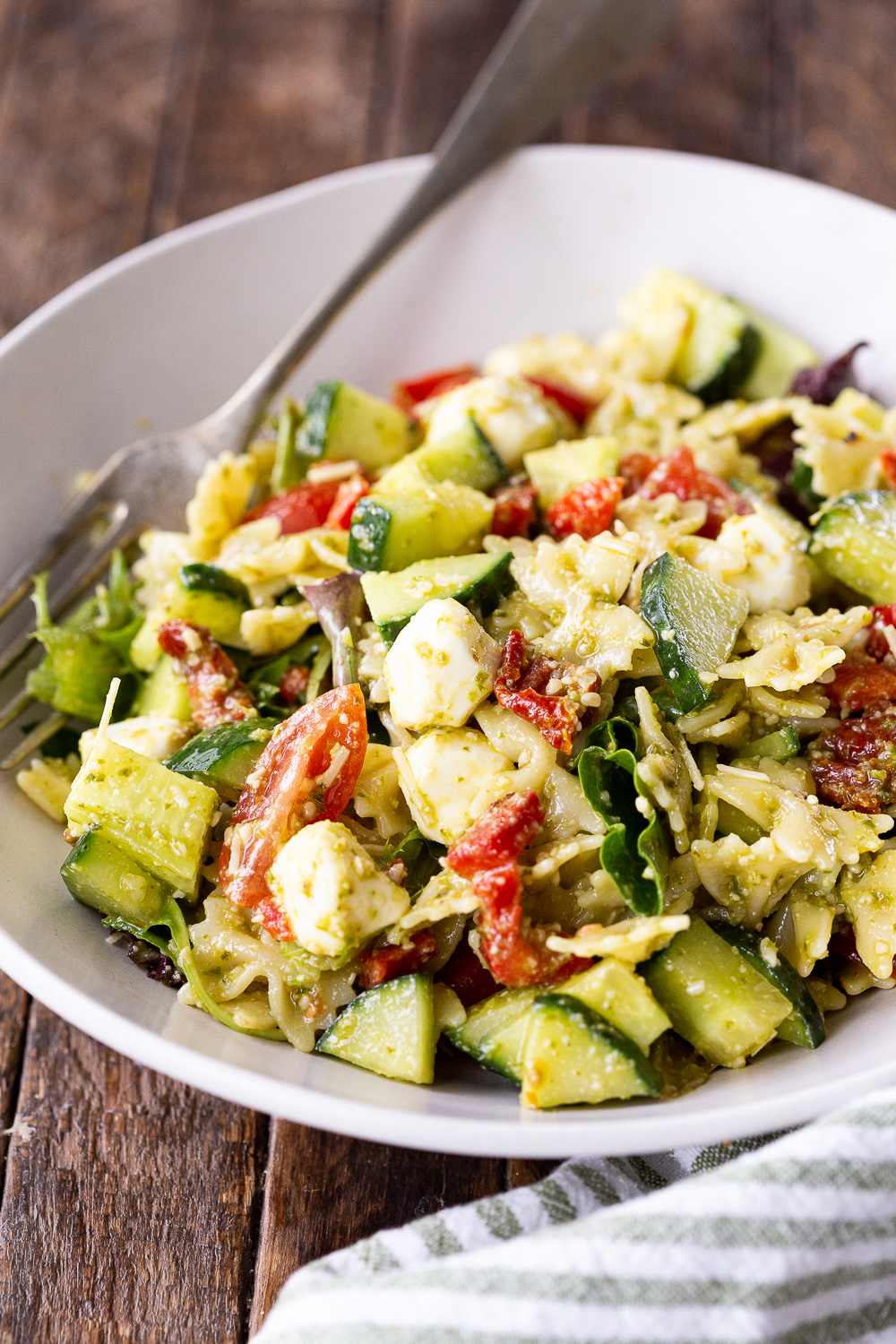 A bowl of pesto pasta salad, a simple summer pasta salad with only a few ingredients and a sauce made from prepared pesto