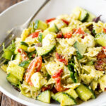 Pesto Pasta Salad is loaded with crunch and flavor, but is only 9 easy to make ingredients.