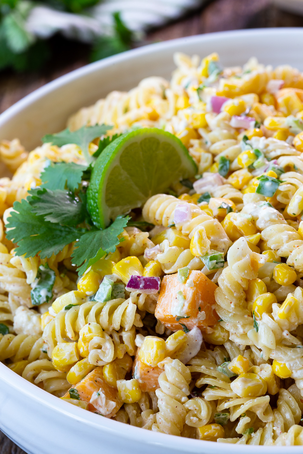 Mexican Street Corn Pasta Salad is a quick and easy pasta salad perfect for BBQs and potlucks, and is inspired by Elote. 